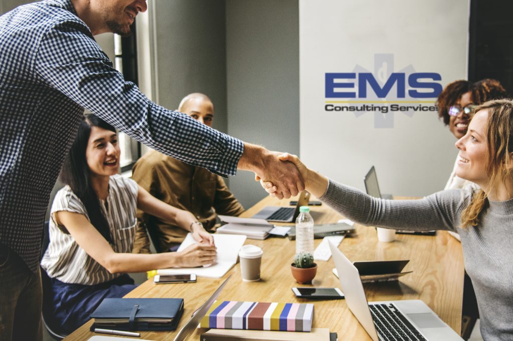Business people shaking hands in agreement